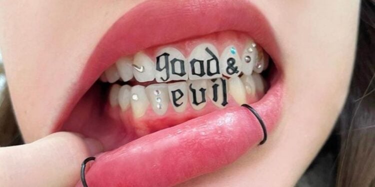 Jovens começam a crescer tendência de tatuar os dentes