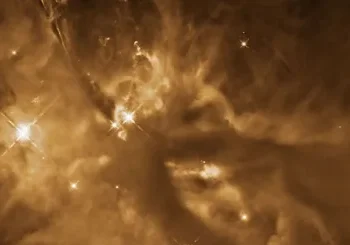 Protoestrela brilhante à esquerda está localizada dentro das Nuvens Moleculares de Órion • NASA, ESA e T. Megeath (Universidade de Toledo)