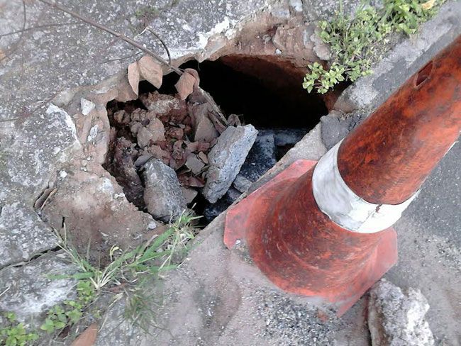 Buraco preocupa moradores no Borboleta 2 Cratera pode ser vista na Rua Humberto Menine