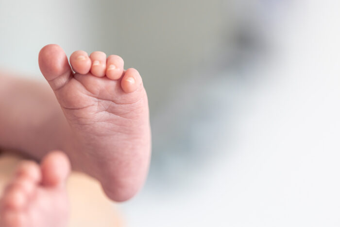 fingers newborn baby macro shot