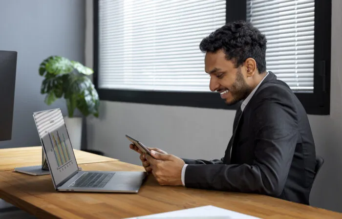 business person looking finance graphs