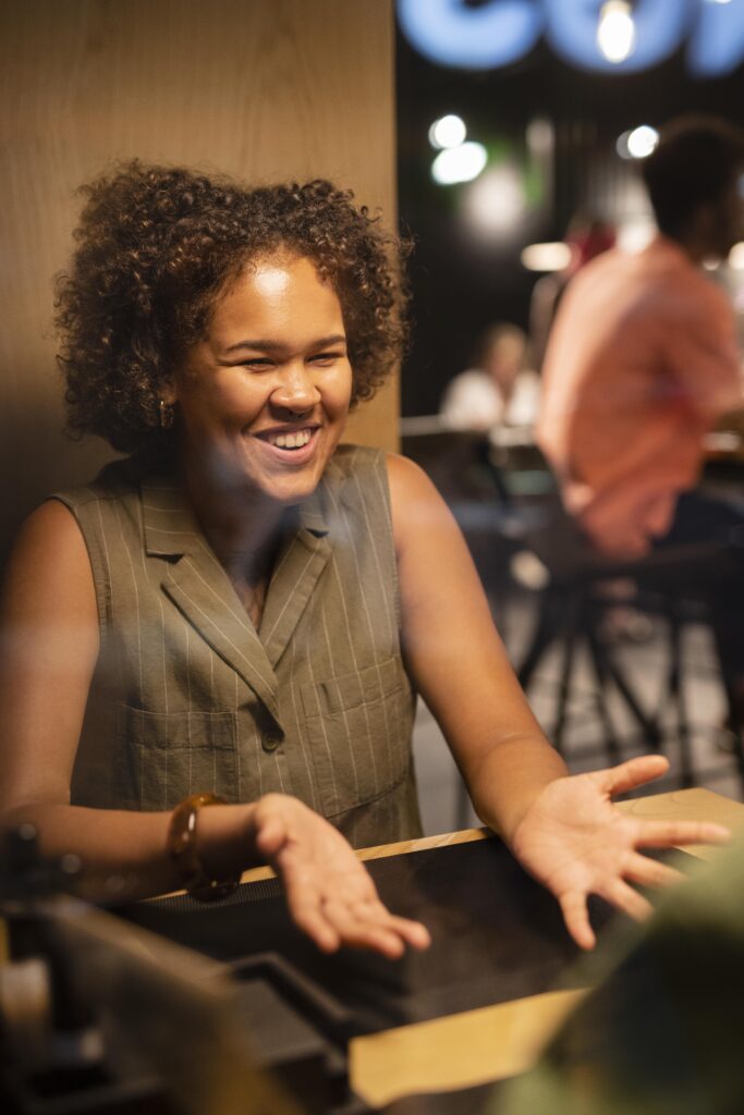 medium shot smiley woman chatting