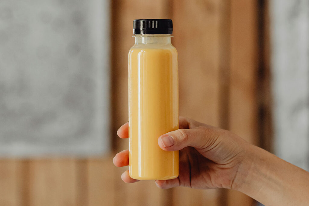 garrafa suco by freepik