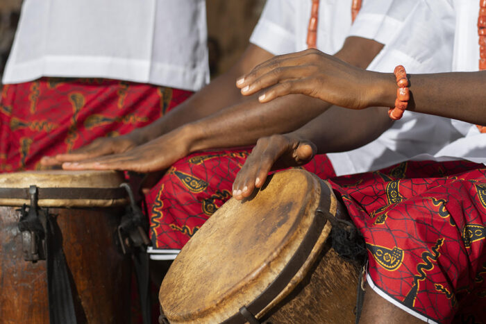 hands playing drums close up site